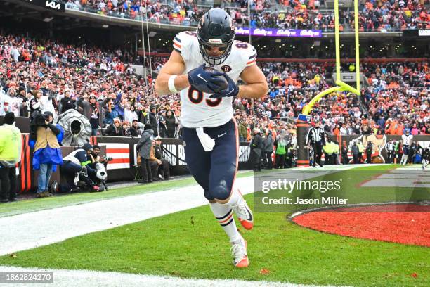 Cole Kmet of the Chicago Bears scores a touchdown during the second quarter against the Cleveland Browns at Cleveland Browns Stadium on December 17,...