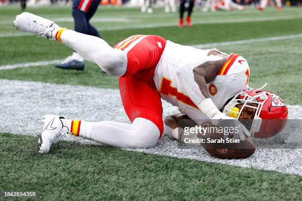 Jerick McKinnon of the Kansas City Chiefs catches a touchdown during the second quarter against the New England Patriots at Gillette Stadium on...