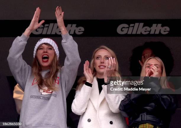 Taylor Swift, Brittany Mahomes, and Ashley Avignone cheer after a Kansas City Chiefs touchdown during the second quarter against the New England...