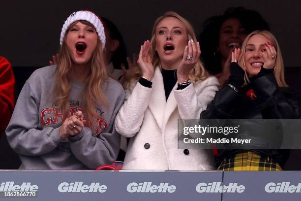 Taylor Swift, Brittany Mahomes, and Ashley Avignone cheer after a Kansas City Chiefs touchdown during the second quarter against the New England...