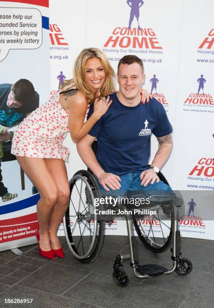 Sarah Harding attends a photocall to launch the Coming Home lottery ticket at Hippodrome Casino on October 30, 2013 in London, England.