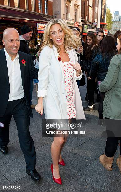 Sarah Harding attends a photocall to launch the Coming Home lottery ticket at Hippodrome Casino on October 30, 2013 in London, England.