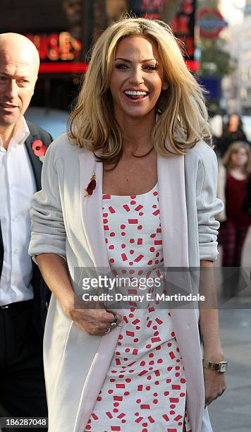 Sarah Harding attends a photocall to launch the Coming Home lottery ticket at Hippodrome Casino on October 30, 2013 in London, England.