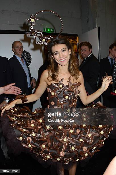 Marie-Ange Casalta dressed by -Manon Bresson-Cancel & Jean-Marc rue et Keiko Orihara attends the Salon Du Chocolat 2014 - Fashion Chocolate Show at...