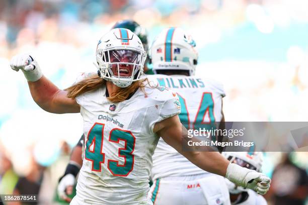 Andrew Van Ginkel of the Miami Dolphins celebrates a second quarter sack against the New York Jets at Hard Rock Stadium on December 17, 2023 in Miami...