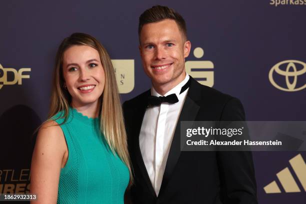 Markus Rehm arrives with Vanessa Low for the "Sportler des Jahres" Award 2023 at Kurhaus Baden-Baden on December 17, 2023 in Baden-Baden, Germany.