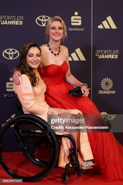 Kristina Vogel arrives with Britta Heidemann for the "Sportler des Jahres" Award 2023 at Kurhaus Baden-Baden on December 17, 2023 in Baden-Baden,...