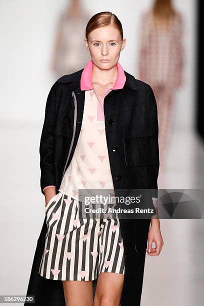 Model walks the runway at the Atelier Galetsky show during Mercedes-Benz Fashion Week Russia S/S 2014 on October 30, 2013 in Moscow, Russia.