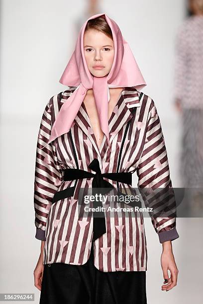 Model walks the runway at the Atelier Galetsky show during Mercedes-Benz Fashion Week Russia S/S 2014 on October 30, 2013 in Moscow, Russia.