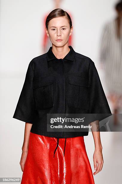 Model walks the runway at the Atelier Galetsky show during Mercedes-Benz Fashion Week Russia S/S 2014 on October 30, 2013 in Moscow, Russia.