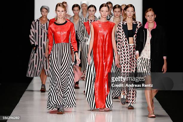 Models walk the runway at the Atelier Galetsky show during Mercedes-Benz Fashion Week Russia S/S 2014 on October 30, 2013 in Moscow, Russia.