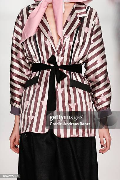 Model walks the runway at the Atelier Galetsky show during Mercedes-Benz Fashion Week Russia S/S 2014 on October 30, 2013 in Moscow, Russia.