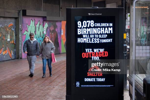 Advertising for the homeless charity Shelter which says that thousands of children will go to sleep homeless tonight on 14th December 2023 in...
