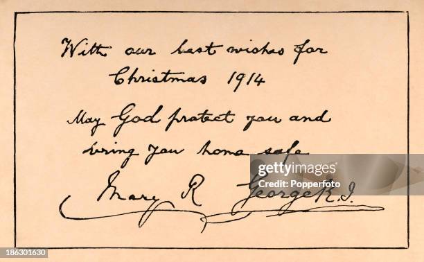 Christmas greetings over the signatures of King George V and Queen Mary sent to British Armed Forces fighting in World War One, circa December 1914.