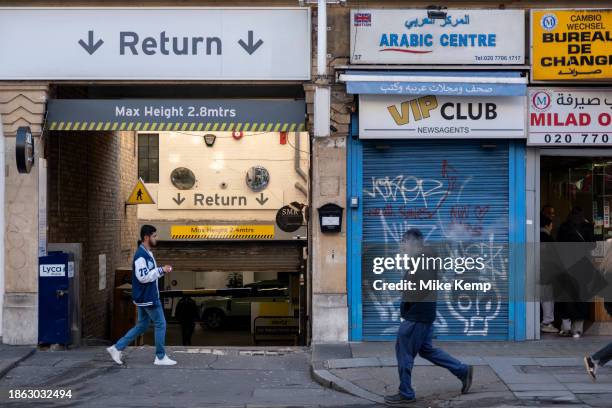 Small business with shutters down on Edgware Road next to the Hertz car rental returns entrance on 6th December 2023 in London, United Kingdom.