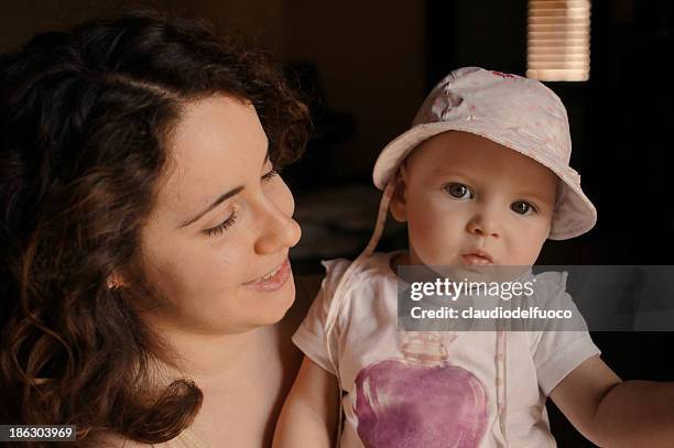 a girl and a baby - hazel bond fotografías e imágenes de stock