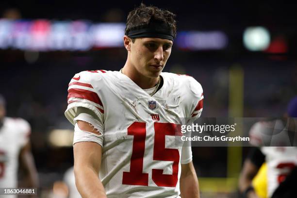 Tommy DeVito of the New York Giants walks off the field after the game against the New Orleans Saints at Caesars Superdome on December 17, 2023 in...