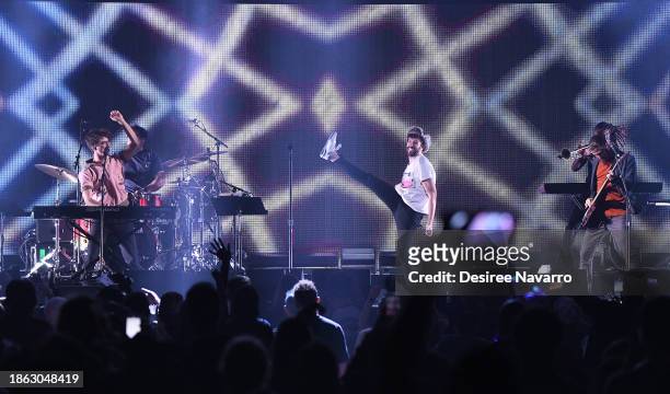Ryan Met, Jack Met, and Adam Brett Met of AJR perform onstage during iHeartRadio Y100's Jingle Ball 2023 at Amerant Bank Arena on December 16, 2023...
