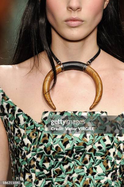 Model walks the runway during the Tufi Duek show at the Sao Paulo Fashion Week Winter 2014 on October 28, 2013 in Sao Paulo, Brazil.