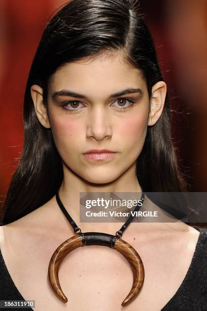 Model walks the runway during the Tufi Duek show at the Sao Paulo Fashion Week Winter 2014 on October 28, 2013 in Sao Paulo, Brazil.