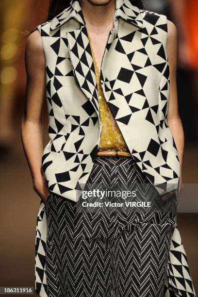 Model walks the runway during the Tufi Duek show at the Sao Paulo Fashion Week Winter 2014 on October 28, 2013 in Sao Paulo, Brazil.