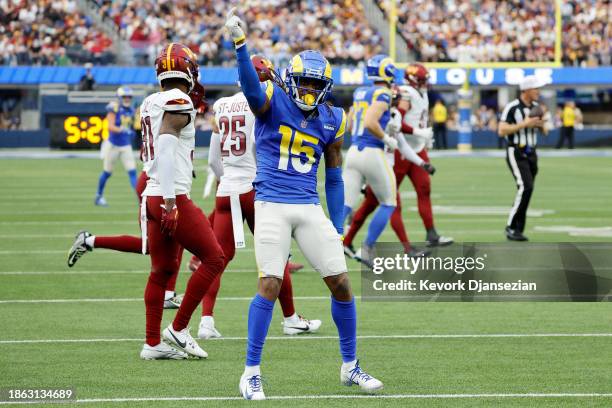 Demarcus Robinson of the Los Angeles Rams reacts after carrying the ball during the first half of the game against the Washington Commanders at SoFi...