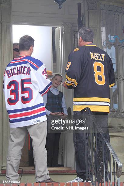 Mike Richter of the New York Rangers and Cam Neely of the Boston Bruins perform on the set of the 2013 Discover NHL Thanksgiving Showdown NBC...