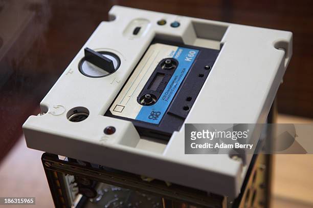 The cassette recorder of an eavesdropping device is displayed at the Stasi , or East German Secret Police Museum, on October 30, 2013 in Berlin,...