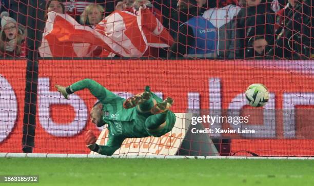 Arnau Tenas of Paris Saint-Germain misses a goal by Jonathan David of Lille in overtime during the Ligue 1 Uber Eats match between Lille OSC and...