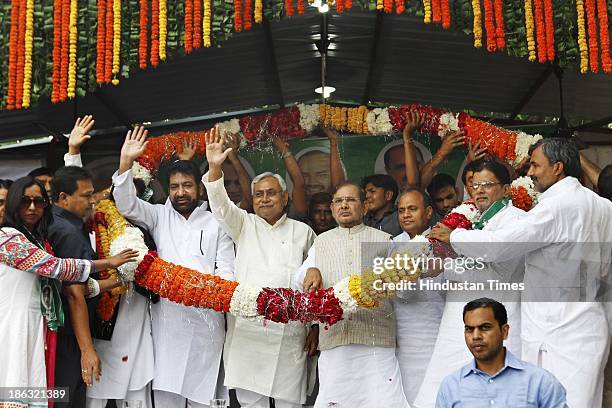 Bihar Chief Minister Nitish Kumar and JD President Sharad Yadav with Shoaib Iqbal, Lok Janshakti Party MLA from Matia Mahal and four councilors who...