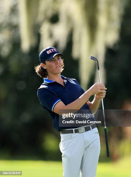 Cameron Kuchar of The United States plays his second shot on the ninth hole during the final round of the PNC Championship at The Ritz-Carlton Golf...