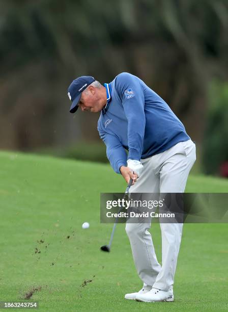 Matt Kuchar of The United States plays his second shot on the 18th hole during the final round of the PNC Championship at The Ritz-Carlton Golf Club...