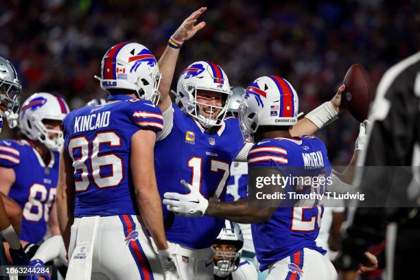 Josh Allen of the Buffalo Bills celebrates after his rushing touchdown during the second quarter against the Dallas Cowboys at Highmark Stadium on...
