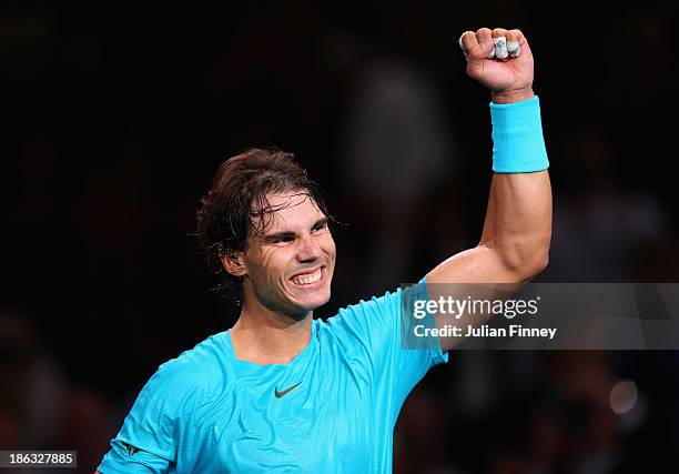 Rafael Nadal of Spain celebrates defeating Marcel Granollers of Spain during day three of the BNP Paribas Masters at Palais Omnisports de Bercy on...