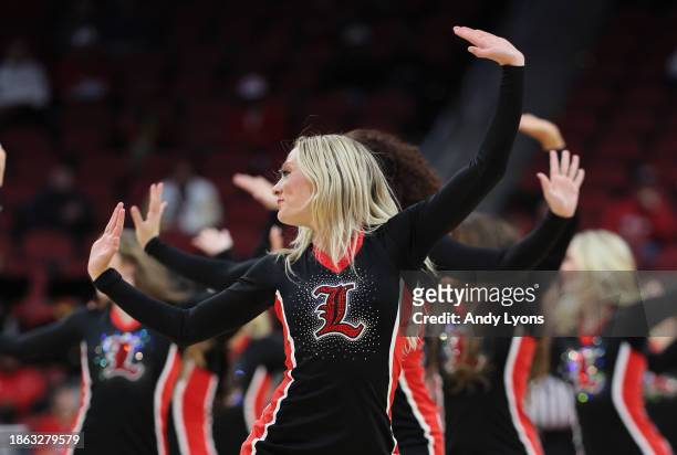 Louisville Cardinals cheerleaders perform during the game against the Pepperdine Waves at KFC YUM! Center on December 17, 2023 in Louisville,...