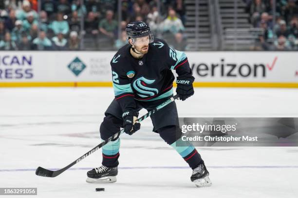 Oliver Bjorkstrand of the Seattle Kraken skates with the puck against the Los Angeles Kings during the third period at Climate Pledge Arena on...