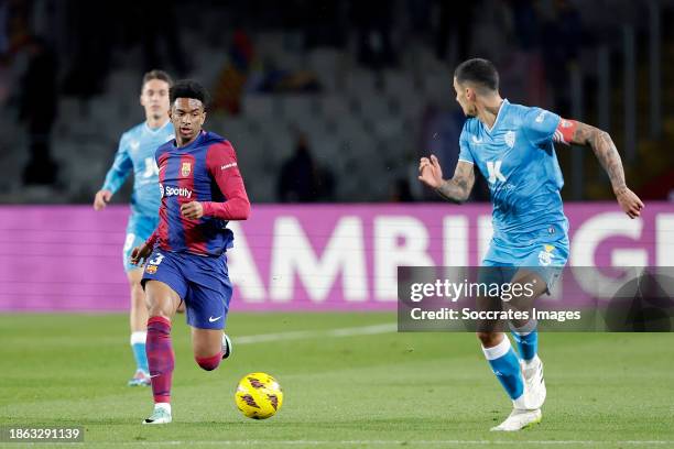 Alejandro Balde of FC Barcelona, Juan Brandariz Chumi of UD Almeria during the LaLiga EA Sports match between FC Barcelona v UD Almeria at the Lluis...