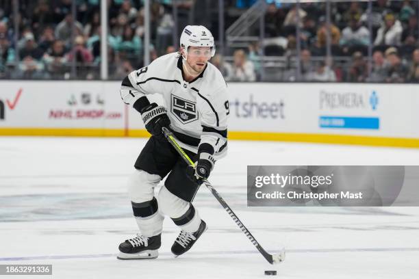 Adrian Kempe of the Los Angeles Kings skates with the puck against the Seattle Kraken during the third period of a game at Climate Pledge Arena on...