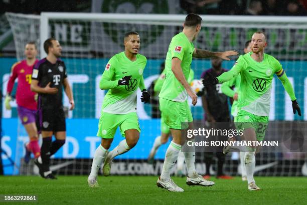 Wolfsburg's German midfielder Maximilian Arnold celebrates scoring the 1-2 goal during the German first division Bundesliga football match between...