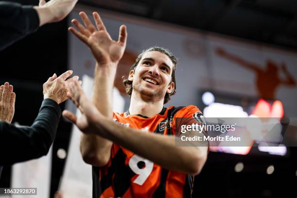 Timothee Carle of the BR Volleys celebrates the win after the game between the BR Volleys and Halkbank Ankara on December 20, 2023 in Berlin, Germany.