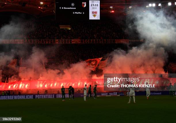 Stuttgart's fans show a banner reading "Merry Christmas to all Stuttgart fans " during the German first division Bundesliga football match between...