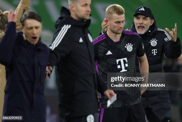 Bayern Munich's German head coach Thomas Tuchel remonstrates with Wolfsburg's Croatian head coach Niko Kovac during the German first division...