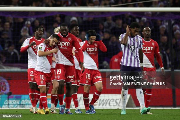 Monaco's players celebrate after scoring their team's first goal during the French L1 football match between Toulouse FC and Monaco AS at the TFC...