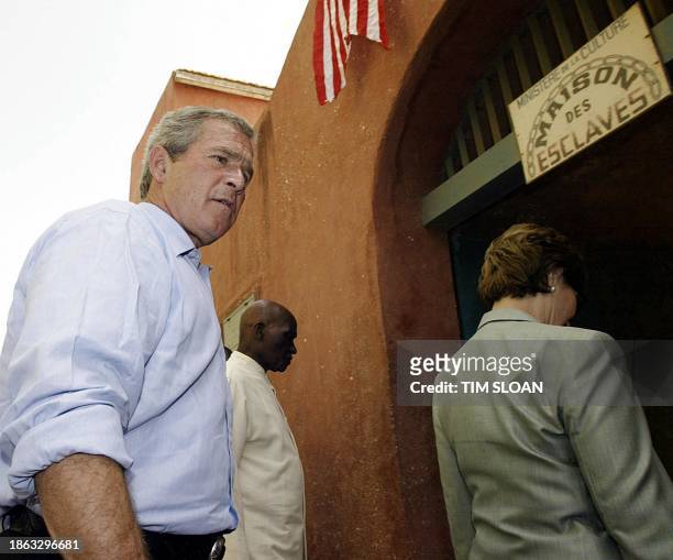 President George W. Bush , First Lady Laura Bush , and Senegal's President Abdoulaye Wade , tour a "slave house" on Goree Island in Senegal 08 July...