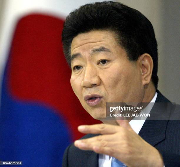 South Korean President Roh Moo-Hyun speaks during a press conference at the Presidential Blue House in Seoul, 21 July 2003. Roh, 21 July, played down...