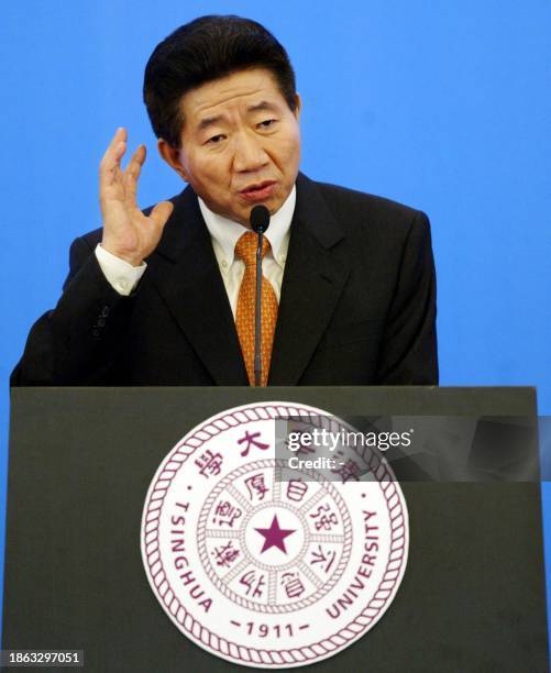 South Korean President Roh Moo-Hyun gestures as he delives his speech at Tsinghua University in Beijing, 09 July 2003. Roh sought to reassure North...