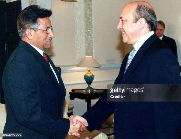 Russian Foreign Minister Igor Ivanov is greeted by Pakistani President Pervez Musharraf in Rawalpindi, 15 June 2003. Ivanov, who has left for India...