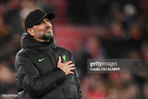 Liverpool's German manager Jurgen Klopp celebrates after his team victory at the end of the English League Cup quarter-final football match between...