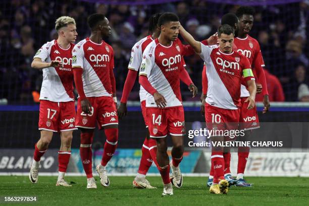 Monaco's players celebrate after their team's second goal during the French L1 football match between Toulouse FC and Monaco AS at the TFC Stadium in...