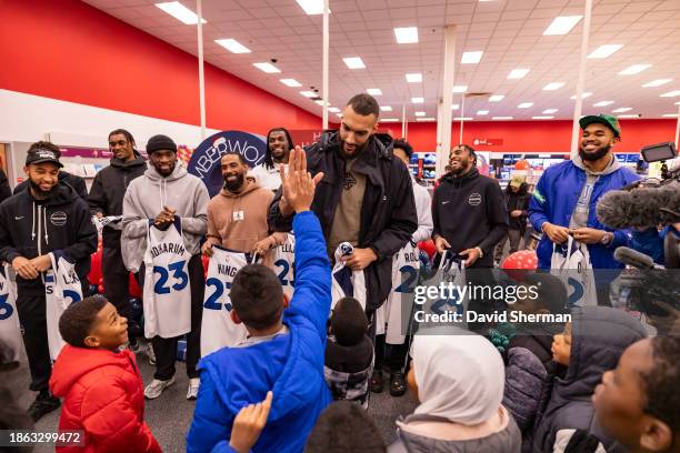 Minnesota Timberwolves players and staff in partnership with A Mother's Love Initiative go holiday shopping with children on December 15, 2023 at...